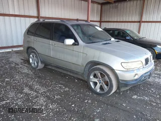 2001 BMW X5 3.0i with VIN WBAFA53591LH79412, listed as a IAAI auction lot 41410946 with 186,315 mi miles. Bid and sale history available at carsss.com. Image 1.
