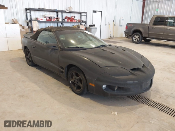 2000 Pontiac Firebird Firebird z VIN 2G2FS32KXY2146392, wystawiony jako IAAI lot #42506629 z przebiegiem 161 077 mil mil oraz . Historia ofert i sprzedaży dostępna na DreamBid. Obrazek 1.