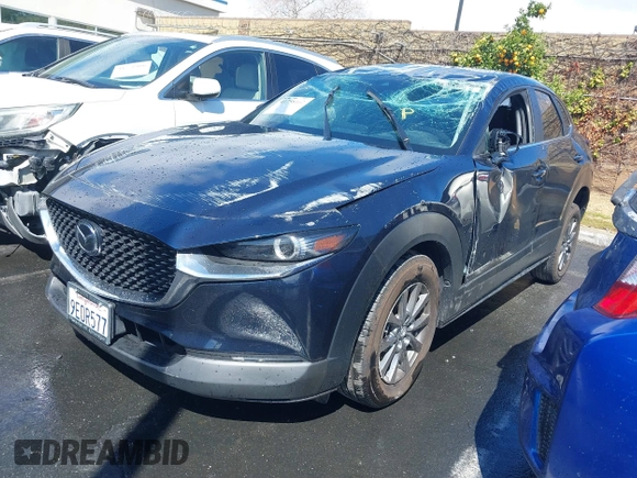 2023 Mazda CX-30 S with VIN 3MVDMBAM9PM541315, listed as a IAAI auction lot 41758162 with 46,296 mi miles and . Bid and sale history available at carsss.com. Image 2.