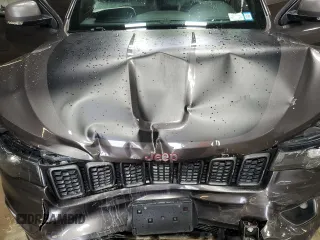 2018 Jeep Grand Cherokee Trailhawk with VIN 1C4RJFLG5JC504494, listed as a Copart auction lot 62953935 with 84,392 mi miles and Salvage title. Bid and sale history available at DreamBid. Image 12.