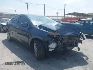 2019 Toyota Corolla L z VIN 2T1BURHE4KC215942, wystawiony jako IAAI lot #42104097 z przebiegiem 87 020 mil mil oraz . Historia ofert i sprzedaży dostępna na DreamBid. Obrazek 1.