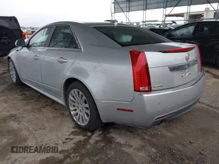 2013 Cadillac CTS Premium z VIN 1G6DP5E3XD0128204, wystawiony jako IAAI lot #42165101 z przebiegiem 88 425 mil mil oraz . Historia ofert i sprzedaży dostępna na DreamBid. Obrazek 3.