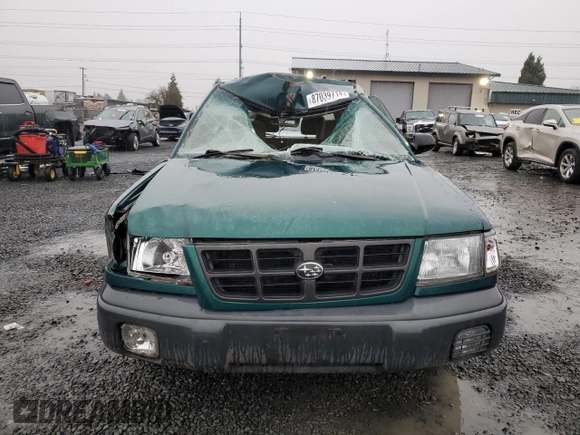 1999 Subaru Forester L with VIN JF1SF6356XH732233, listed as a Copart auction lot 87039714 with 170,275 mi miles and Salvage Title. Bid and sale history available at carsss.com. Image 5.