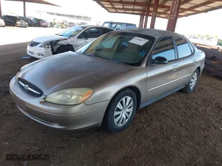 2002 Ford Taurus LX with VIN 1FAFP52U72G284116, listed as a IAAI auction lot 42004075 with 86,544 mi miles. Bid and sale history available at carsss.com. Image 2.