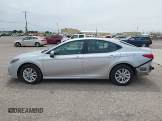 2025 Toyota Camry LE with VIN 4T1DAACK8SU512341, listed as a IAAI auction lot 42210426 with 14,276 mi miles and . Bid and sale history available at DreamBid. Image 14.