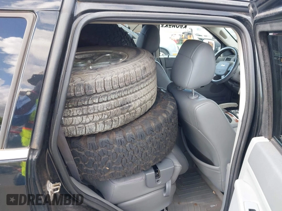 2007 Jeep Grand Cherokee Limited with VIN 1J8HR58N27C594744, listed as a IAAI auction lot 41929390 with 154,140 mi miles and . Bid and sale history available at DreamBid. Image 8.