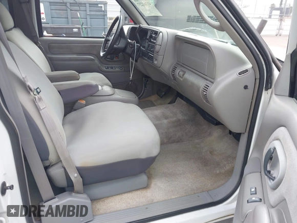 1999 Chevrolet Suburban with VIN 3GNEC16R2XG247140, listed as a IAAI auction lot 41761237 with 202,121 mi miles. Bid and sale history available at carsss.com. Image 5.