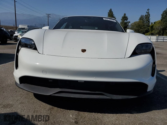 2021 Porsche Taycan z VIN WP0AA2Y15MSA17464, wystawiony jako Copart lot #52412815 z przebiegiem 27 136 mil mil oraz Szkoda całkowita • Salvage title. Historia ofert i sprzedaży dostępna na DreamBid. Obrazek 5.