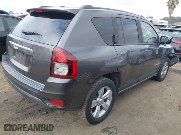 2014 Jeep Compass Sport with VIN 1C4NJCBB4ED789823, listed as a IAAI auction lot 41215251 with 152,709 mi miles. Bid and sale history available at carsss.com. Image 4.