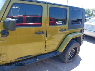 2008 Jeep Wrangler Unlimited Sahara with VIN 1J4GA59128L608191, listed as a IAAI auction lot 42669266 with 201,156 mi miles and . Bid and sale history available at DreamBid. Image 14.