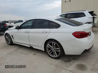2018 BMW 4 Series 440i with VIN WBA4J5C51JBF06736, listed as a Copart auction lot 64165524 with 65,066 mi miles and Salvage Title. Bid and sale history available at DreamBid. Image 2.