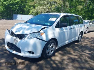 2015 Toyota Sienna L with VIN 5TDZK3DCXFS640245, listed as a IAAI auction lot 42310815 with 76,260 mi miles and . Bid and sale history available at DreamBid. Image 2.