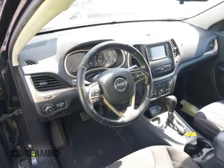 2015 Jeep Cherokee Latitude with VIN 1C4PJLCB9FW627909, listed as a IAAI auction lot 42034667 with 131,739 mi miles and . Bid and sale history available at carsss.com. Image 21.