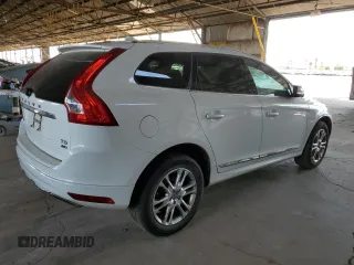 2015 Volvo XC60 T5 z VIN YV4612RK2F2629504, wystawiony jako Copart lot #57691125 z przebiegiem 164 340 mil mil oraz Czysty tytuł • Clean title. Historia ofert i sprzedaży dostępna na DreamBid. Obrazek 3.