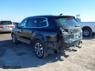 2021 Kia Telluride EX with VIN 5XYP34HC4MG136885, listed as a IAAI auction lot 41144633 with 129,689 mi miles. Bid and sale history available at carsss.com. Image 3.