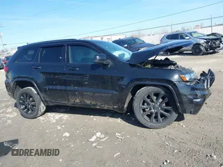 2019 Jeep Grand Cherokee Laredo E with VIN 1C4RJFAG6KC661777, listed as a IAAI auction lot 41762646 with 103,547 mi miles. Bid and sale history available at carsss.com. Image 13.