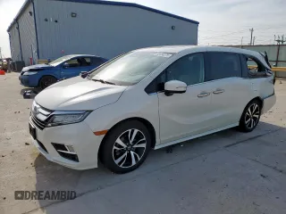 2018 Honda Odyssey Elite with VIN 5FNRL6H96JB098815, listed as a Copart auction lot 59488375 with 76,987 mi miles and Salvage title. Bid and sale history available at DreamBid. Image 1.