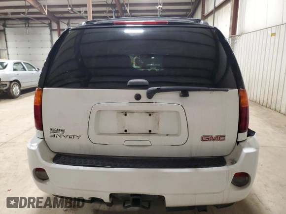 2007 GMC Envoy Denali with VIN 1GKET63M672302913, listed as a Copart auction lot 45098115 with 137,810 mi miles and Salvage Title. Bid and sale history available at carsss.com. Image 6.
