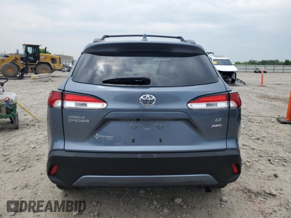 2024 Toyota Corolla Cross LE with VIN 7MUCAABGXRV118308, listed as a Copart auction lot 59959645 with 11,972 mi miles and Non repairable. Bid and sale history available at DreamBid. Image 6.
