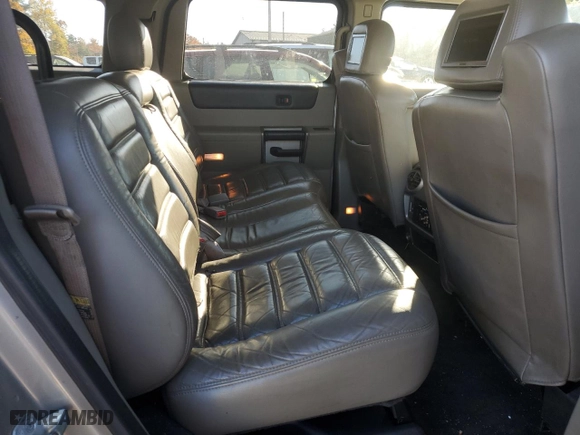 2003 Hummer H2 with VIN 5GRGN23U23H138301, listed as a Copart auction lot 77449044 with 172,174 mi miles and Salvage Title. Bid and sale history available at carsss.com. Image 11.