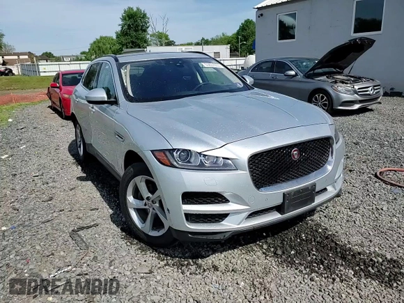 2019 Jaguar F-Pace 25t Premium with VIN SADCJ2FX5KA355404, listed as a Copart auction lot 55657935 with 56,832 mi miles and Salvage title. Bid and sale history available at DreamBid. Image 15.