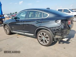 2015 BMW X4 xDrive28i with VIN 5UXXW3C52F0M87621, listed as a Copart auction lot 59176505 with 163,727 mi miles and Salvage title. Bid and sale history available at DreamBid. Image 2.
