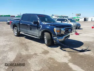 2022 Ford F-150 XL with VIN 1FTFW1E82NKD87353, listed as a IAAI auction lot 41769006 with 69,913 mi miles. Bid and sale history available at carsss.com. Image 1.