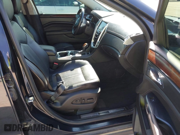 2013 Cadillac SRX Performance Collection with VIN 3GYFNHE35DS548632, listed as a IAAI auction lot 41990670 with 98,659 mi miles. Bid and sale history available at carsss.com. Image 5.