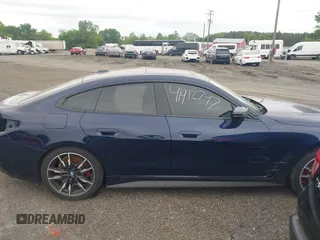 2024 BMW i4 M50 z VIN WBY33AW09RFS45891, wystawiony jako IAAI lot #41912747 z przebiegiem 313 988 mil mil oraz . Historia ofert i sprzedaży dostępna na DreamBid. Obrazek 13.