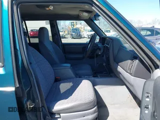 1998 Jeep Cherokee Sport z VIN 1J4FJ68S2WL136129, wystawiony jako IAAI lot #41810918 z przebiegiem 269 989 mil mil oraz . Historia ofert i sprzedaży dostępna na DreamBid. Obrazek 5.