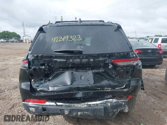 2022 Jeep Grand Cherokee with VIN 1C4RJYB69N8715243, listed as a IAAI auction lot 42319323 with 23,405 mi miles and . Bid and sale history available at DreamBid. Image 17.