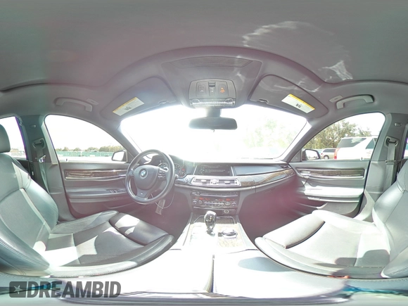 2013 BMW 7 Series 750i with VIN WBAYA8C58DC996431, listed as a Copart auction lot 70366064 with 106,580 mi miles and Salvage Title. Bid and sale history available at DreamBid. Image 12.
