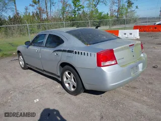 2009 Dodge Charger SXT with VIN 2B3KA33V99H561354, listed as a IAAI auction lot 41840155 with 197462 miles. Bid and sale history available at carsss.com. Image 3.