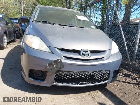 2007 Mazda 5 Touring with VIN JM1CR293870159225, listed as a IAAI auction lot 42031288 with 133,416 mi miles and . Bid and sale history available at carsss.com. Image 6.