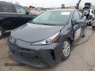 2022 Toyota Prius L Eco with VIN JTDKAMFU3N3190079, listed as a IAAI auction lot 41771356 with 52,607 mi miles and . Bid and sale history available at DreamBid. Image 2.