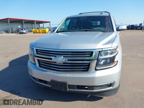 2015 Chevrolet Tahoe LTZ with VIN 1GNSKCKC5FR205739, listed as a IAAI auction lot 40020644 with 142,524 mi miles and . Bid and sale history available at DreamBid. Image 6.