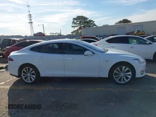 2014 Tesla Model S 60 with VIN 5YJSA1H13EFP62451, listed as a IAAI auction lot 41639068 with 88,000 mi miles and . Bid and sale history available at DreamBid. Image 13.