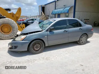 2006 Mitsubishi Lancer ES z VIN JA3AJ26EX6U067642, wystawiony jako Copart lot #56035945 z przebiegiem 163 060 mil mil oraz Szkoda całkowita • Salvage title. Historia ofert i sprzedaży dostępna na DreamBid. Obrazek 1.