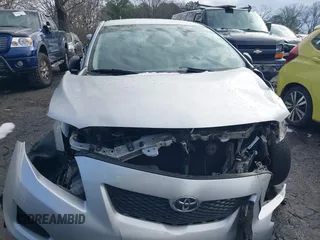 2009 Toyota Corolla with VIN JTDBL40E899083155, listed as a IAAI auction lot 41056942 with 294,132 mi miles. Bid and sale history available at carsss.com. Image 12.