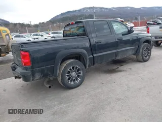2011 Ram Dakota Bighorn/Lonestar with VIN 1D7RW3GK6BS611095, listed as a IAAI auction lot 41433067 with 137,638 mi miles. Bid and sale history available at carsss.com. Image 4.