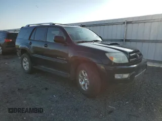 2004 Toyota 4Runner SR5 with VIN JTEBU14R240026497, listed as a Copart auction lot 50223715 with 295,736 mi miles and Salvage title. Bid and sale history available at DreamBid. Image 4.