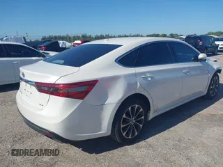 2016 Toyota Avalon Limited with VIN 4T1BK1EB1GU207322, listed as a IAAI auction lot 42030270 with 77,127 mi miles and . Bid and sale history available at carsss.com. Image 4.