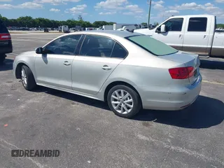 2011 Volkswagen Jetta SE with VIN 3VWDX7AJ4BM330363, listed as a IAAI auction lot 41841068 with 154,676 mi miles and . Bid and sale history available at DreamBid. Image 3.