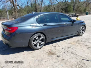 2016 BMW 7 Series 740i with VIN WBA7E2C54GG714649, listed as a IAAI auction lot 41815220 with 89,029 mi miles. Bid and sale history available at carsss.com. Image 4.