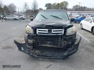 2008 Honda Pilot VP with VIN 5FNYF28218B002162, listed as a IAAI auction lot 39063504 with 252,691 mi miles. Bid and sale history available at carsss.com. Image 12.