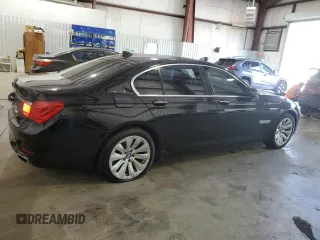 2011 BMW 7 Series with VIN WBAKX6C50BC197118, listed as a Copart auction lot 73686234 with 166,393 mi miles and Clean title. Bid and sale history available at DreamBid. Image 3.