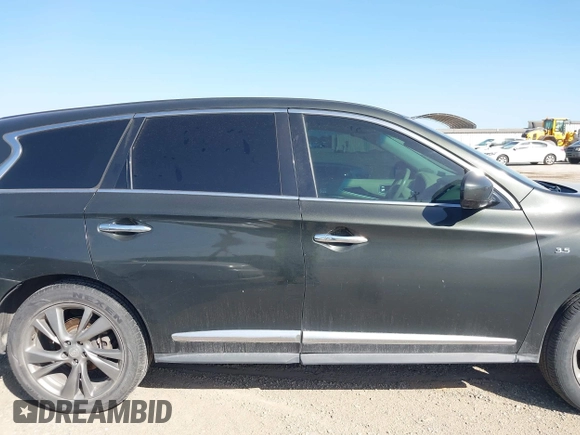 2014 Infiniti QX60 with VIN 5N1AL0MN4EC500276, listed as a IAAI auction lot 42088386 with 125,888 mi miles. Bid and sale history available at carsss.com. Image 13.