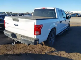 2016 Ford F-150 XL with VIN 1FTEW1CG0GKE05700, listed as a IAAI auction lot 41344898 with 96,429 mi miles and . Bid and sale history available at carsss.com. Image 4.