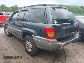 2004 Jeep Grand Cherokee Laredo z VIN 1J4GW48S64C152101, wystawiony jako IAAI lot #42165988 z przebiegiem 244 247 mil mil oraz . Historia ofert i sprzedaży dostępna na DreamBid. Obrazek 3.