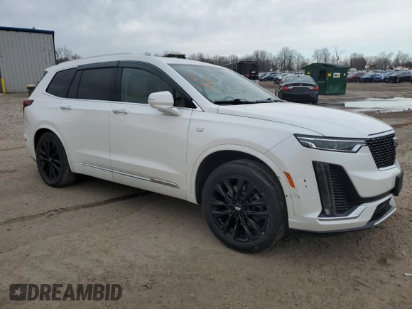 2022 Cadillac XT6 Premium Luxury with VIN 1GYKPFRS2NZ120147, listed as a Copart auction lot 49047855 with 59,691 mi miles and Salvage Title. Bid and sale history available at carsss.com. Image 4.